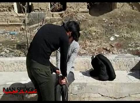 شعبده بازی نجات با دست و پای بسته شده با طناب